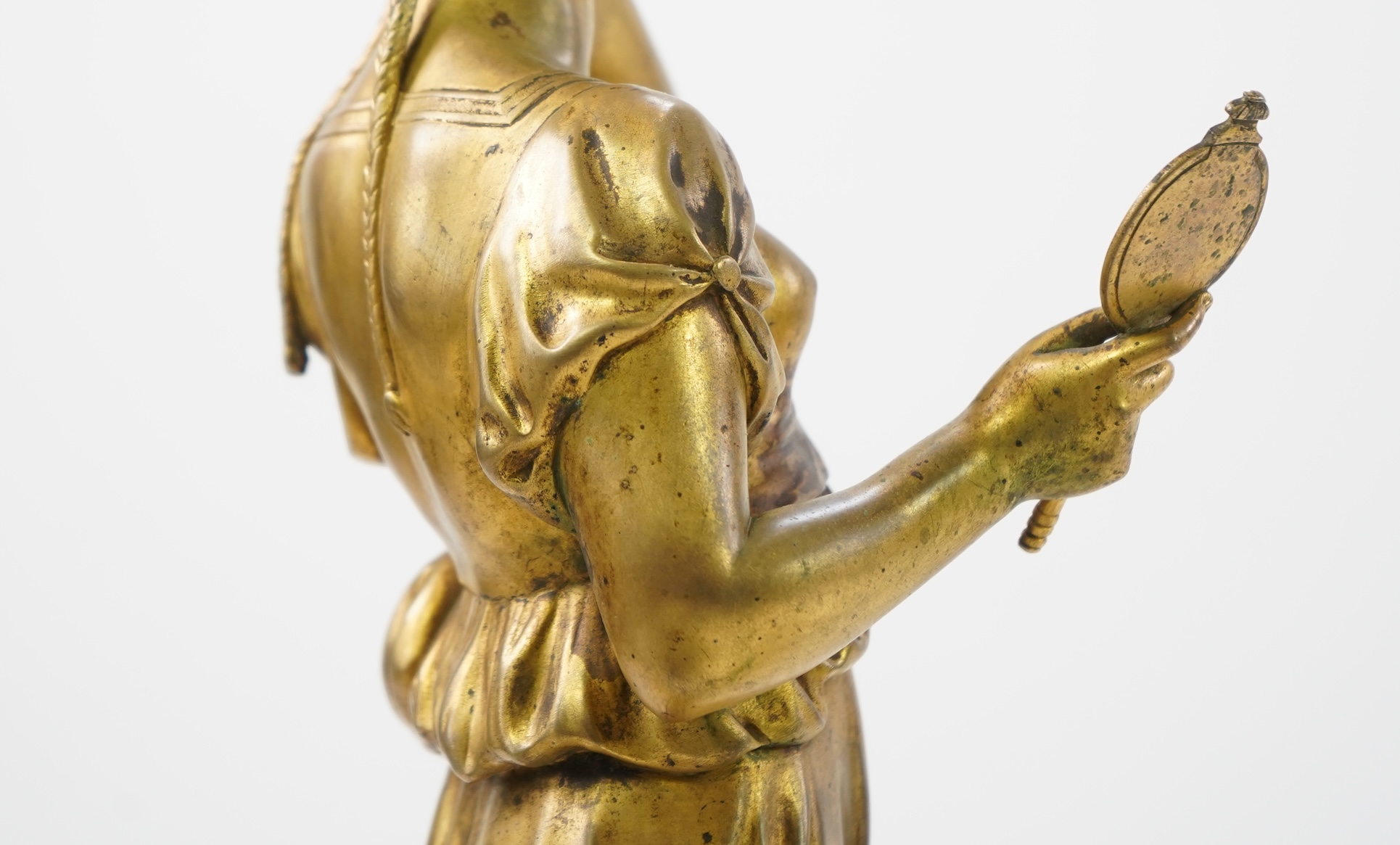 A French gilt bronze figural clock garniture, late 19th century